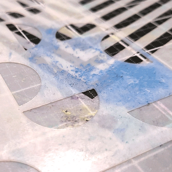 Image of dirty, gummy stencils that need to be cleaned, by Nicole Watt at Nicole Watt Creates